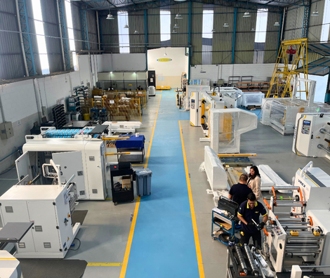 Vemax production facility and converting machinery in an industrial environment